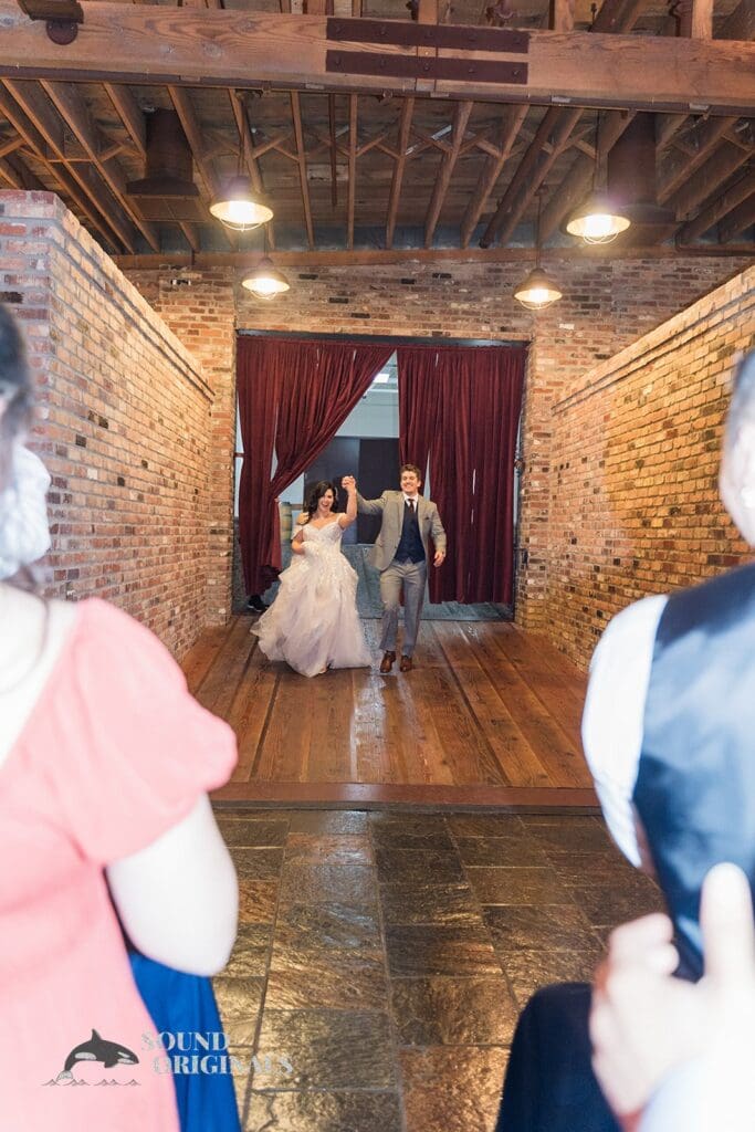 Bride and groom looking joyful after a successful marital vows exchange in the Historic 1625 Tacoma Place Wedding