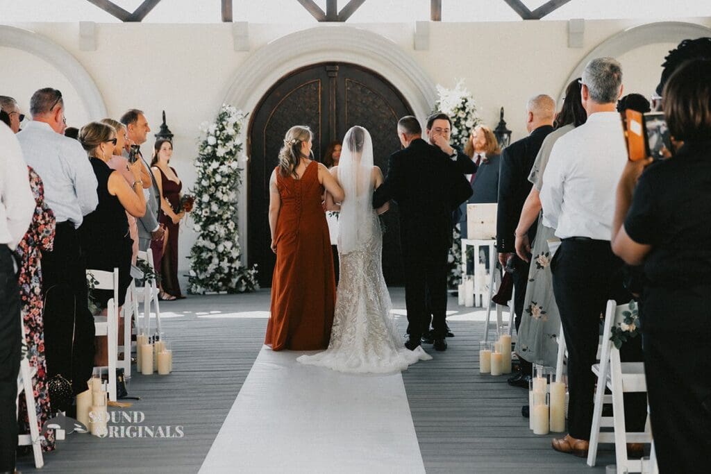 The couple meet at the altar at their Stoney Ridge Villa Wedding