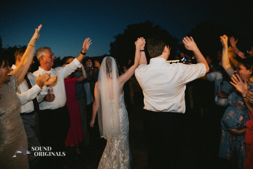 The exit of the bride and groom outside Stoney Ridge Villa Wedding