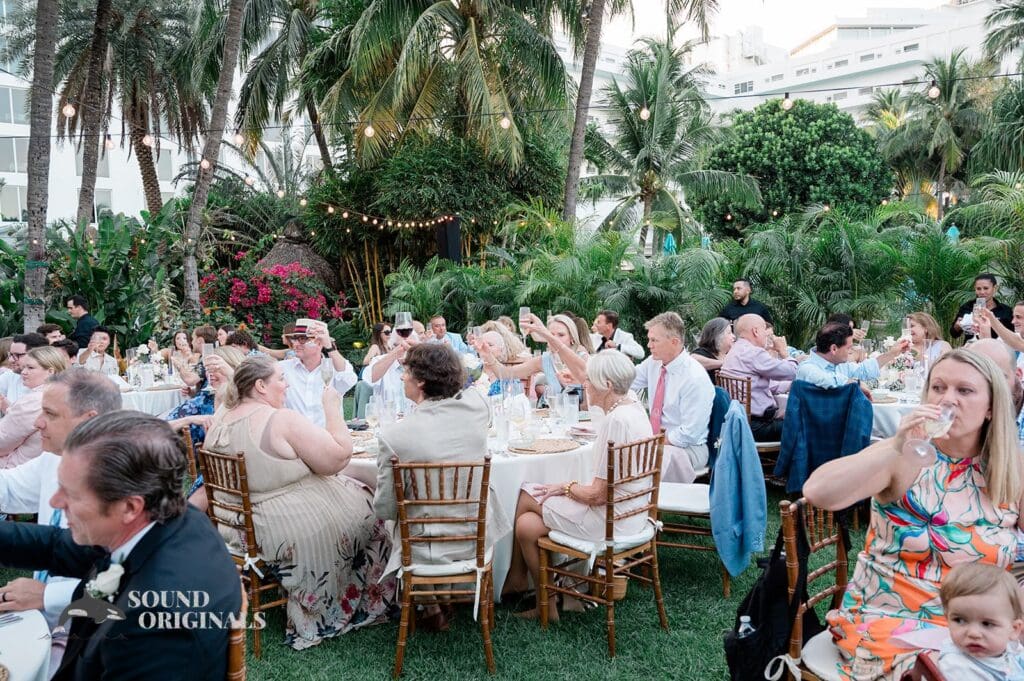 Wedding guests making a toast at The Palms Hotel & Spa Wedding