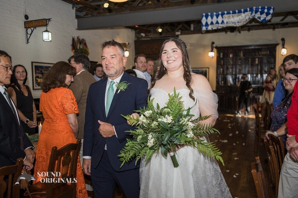 Couple radiance entrance at Willow Heights Mansion reception hall