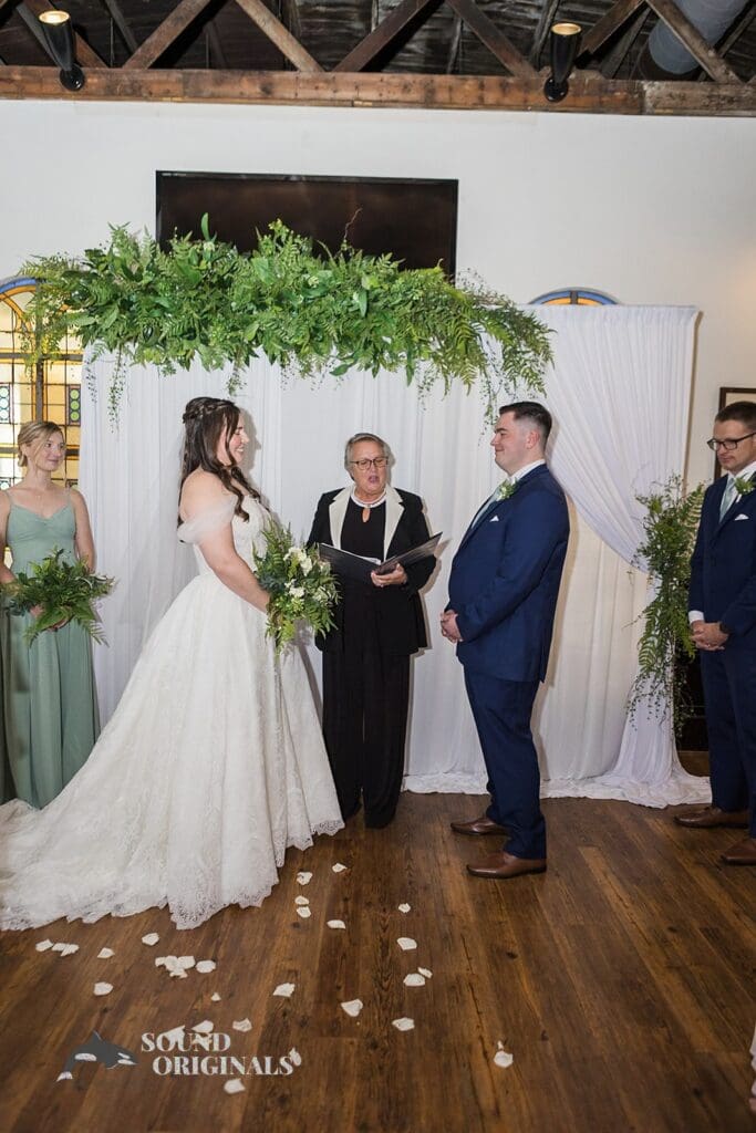 Bride and groom exchanges marital vows at Willow Heights Mansion