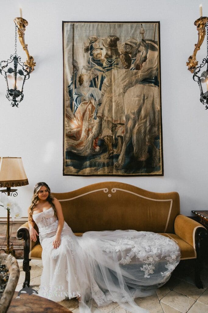 The Havens Country Club bride sits pretty at The venue's room.