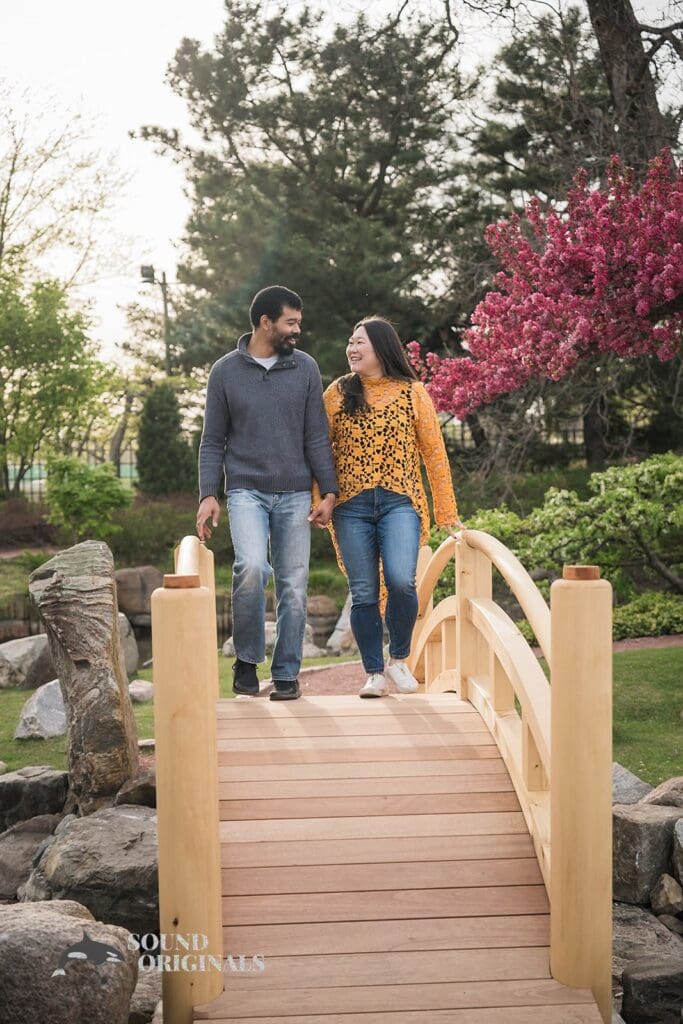 hand in hand over the bridge at Osaka Garden