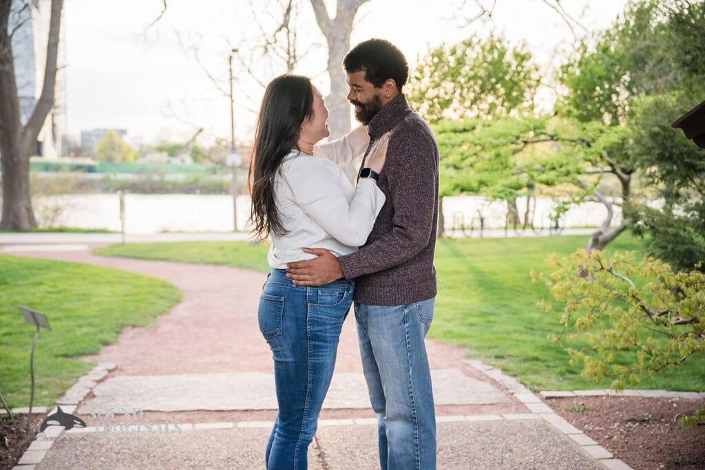 sweet couple hugging at the winding pathway at Osaka Garden