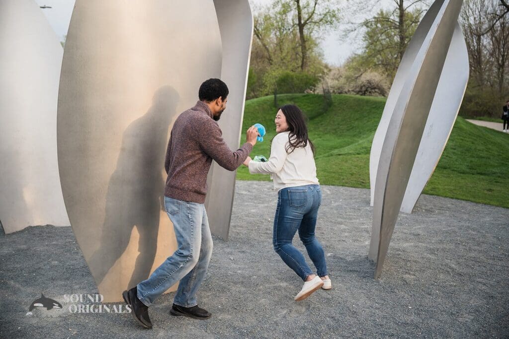 couple chasing each other at Osaka Garden