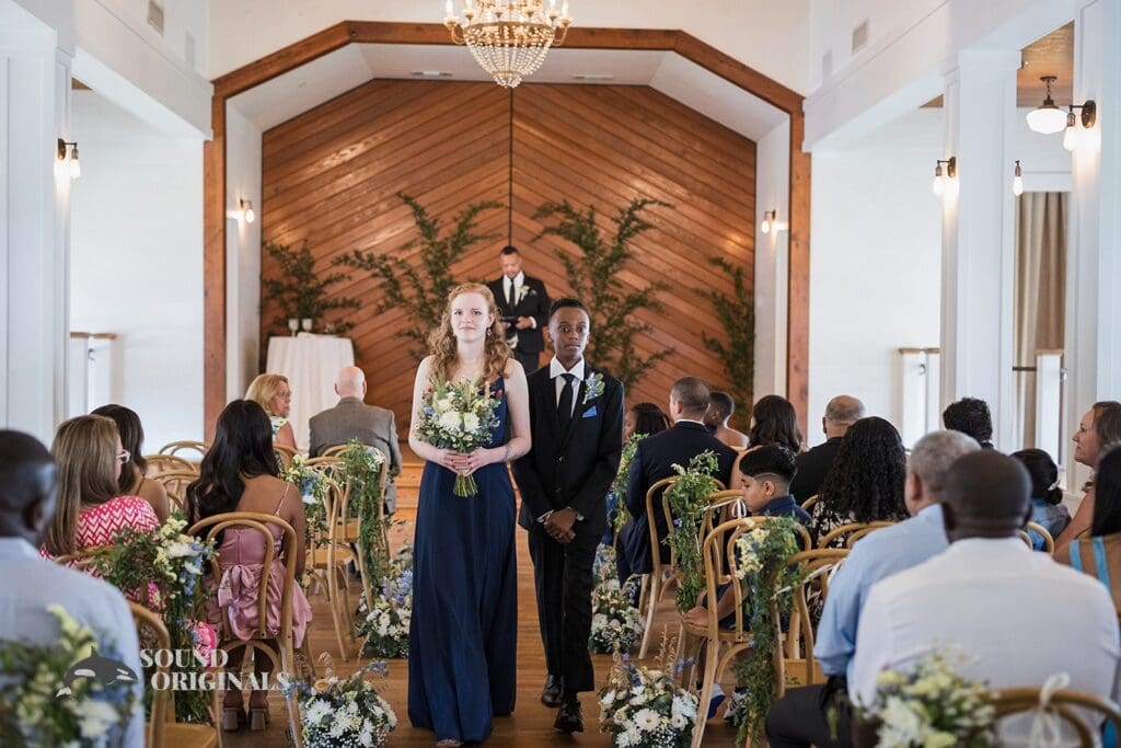 Bride's maid of Honour and groom's man look radiant in The Cliff House Dallas Wedding