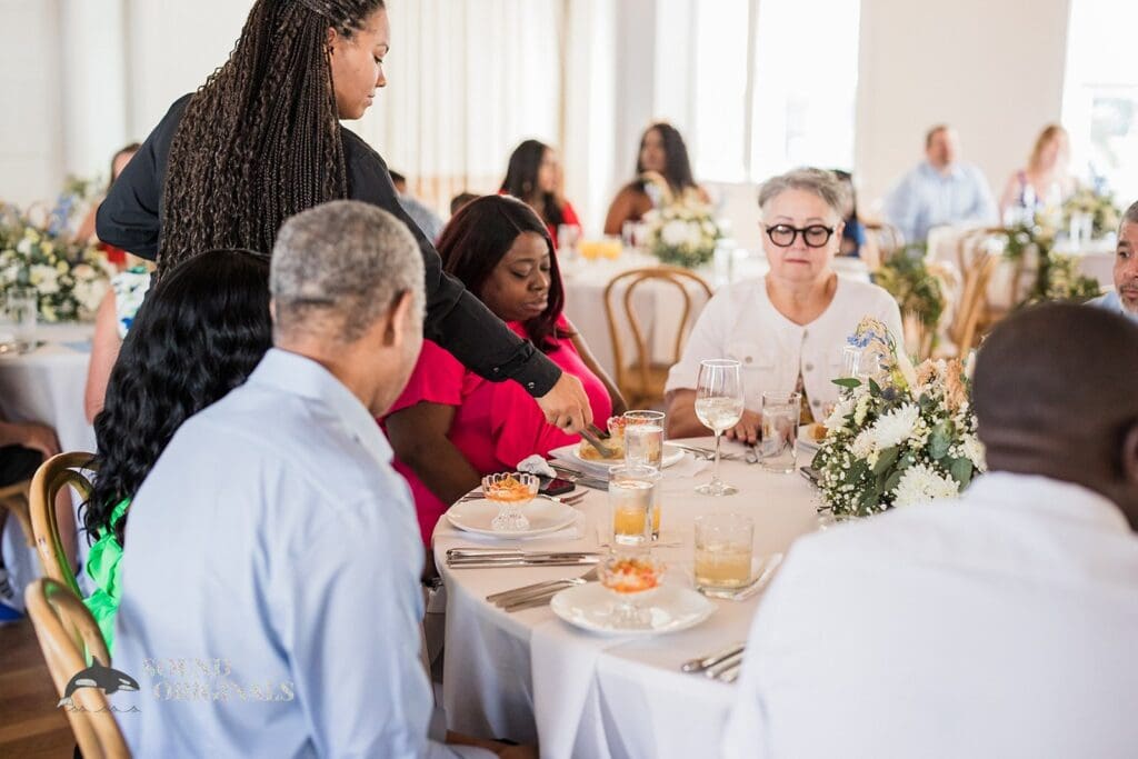 Photographer captures guests in The Cliff House Dallas Wedding reception venue