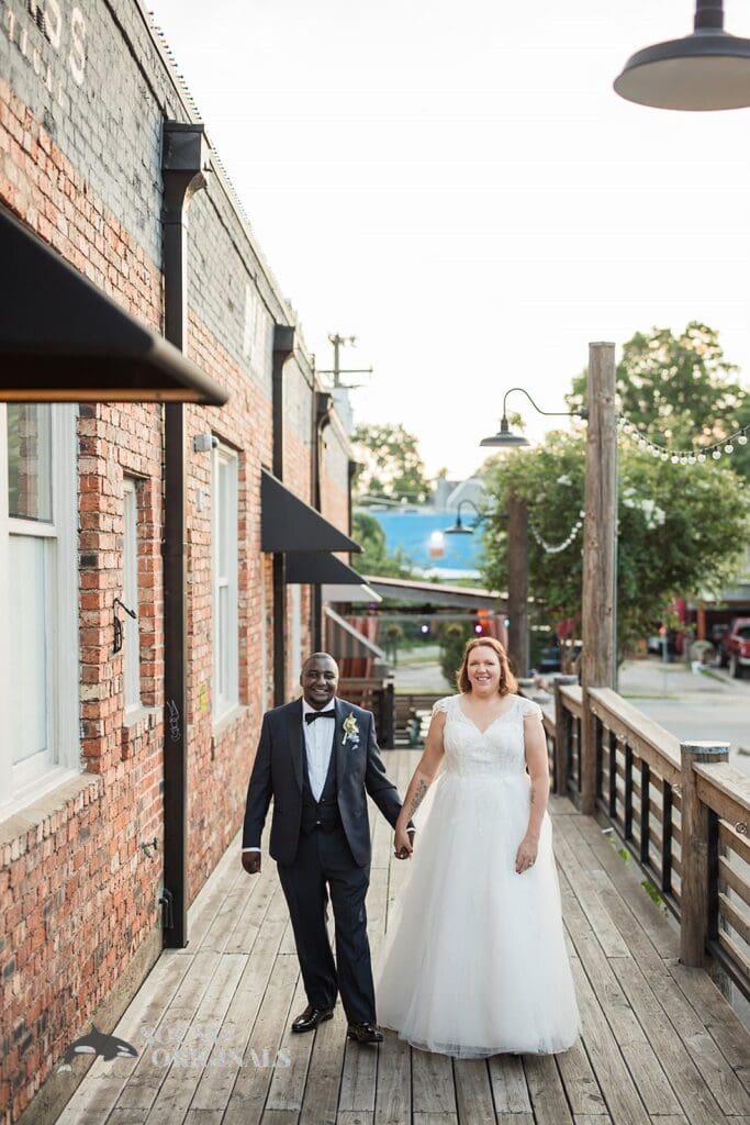 Husband and wife walking down the serene environment of The Cliff House