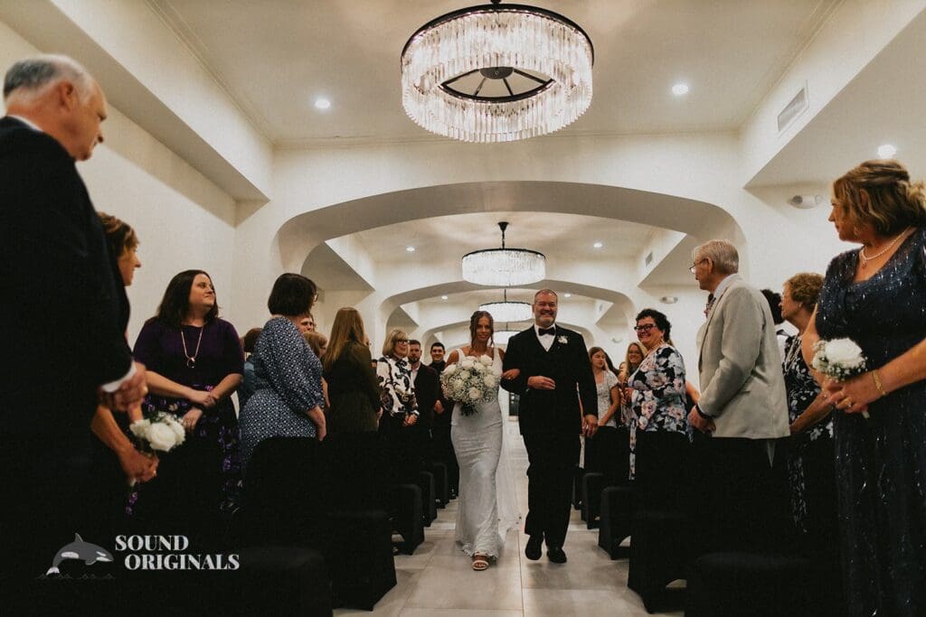 The Bride Walking down the Aisle at The Carlisle Room Wedding