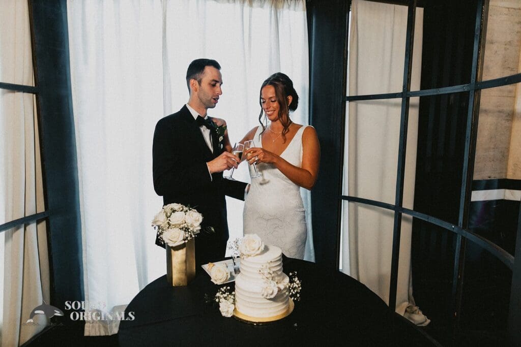 The Couple Say Cheers at The Carlisle Room Wedding