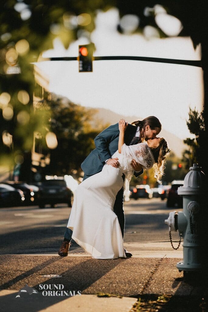 Husband and wife in a romantic moment after a successful Rembrandt Yard Wedding