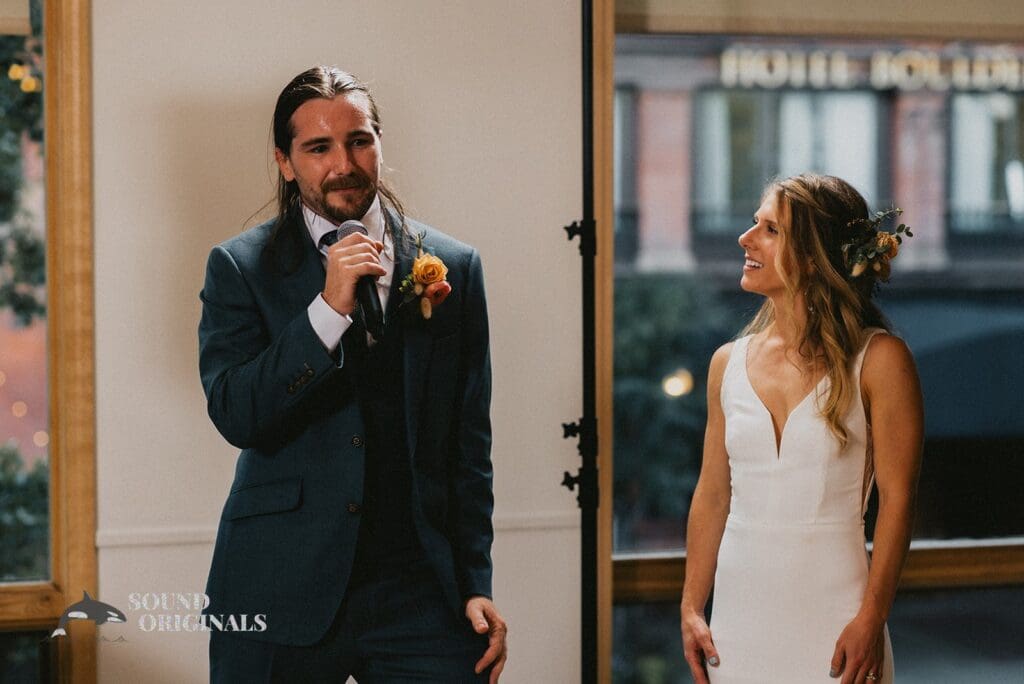 Happy groom addresses the guests after a successful Rembrandt Yard Wedding
