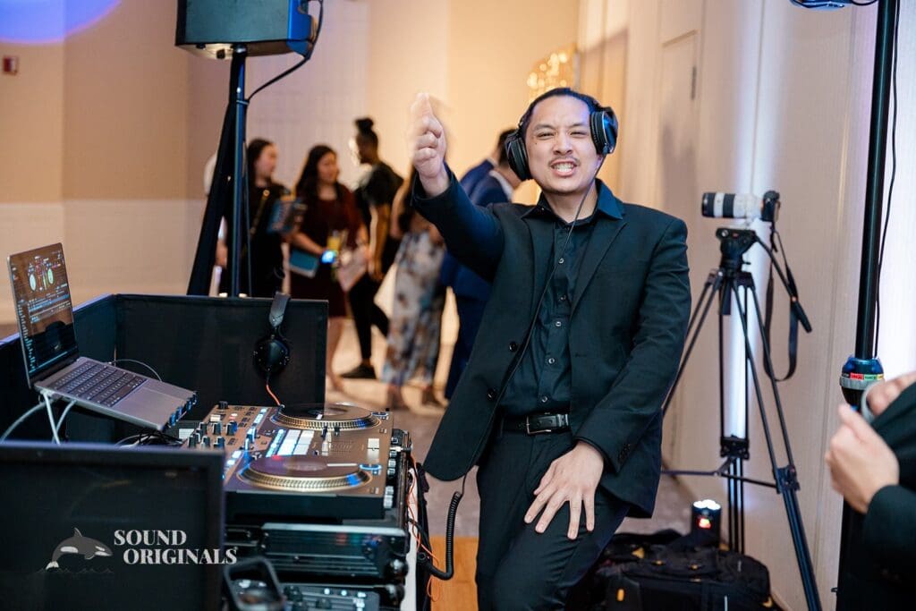 The DJ enjoying the music at The Abbington Distinctive Banquets Wedding