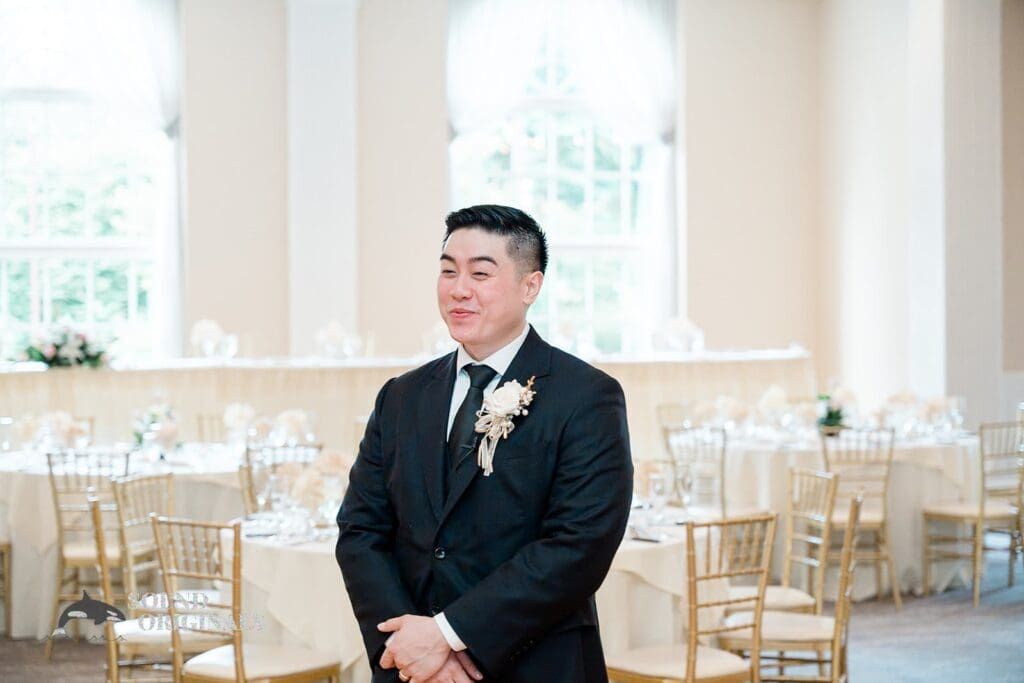 The groom waiting for his bride at The Abbington Distinctive Banquets Wedding