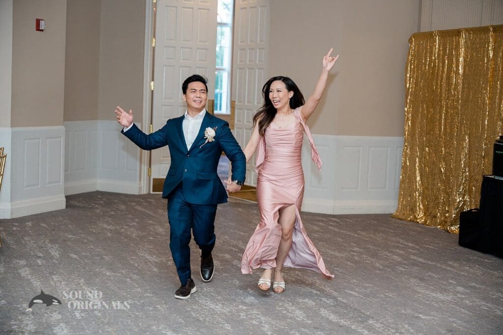 Entrance of bridesmaid and groomsman at The Abbington Distinctive Banquets Wedding