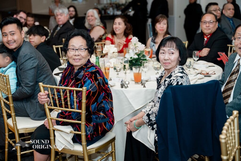 Guests enjoying the speeches at The Abbington Distinctive Banquets Wedding