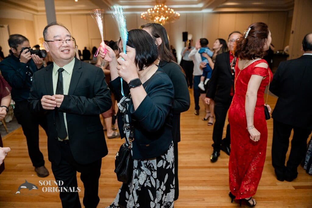 Guests having fun on the dance floor at The Abbington Distinctive Banquets Wedding
