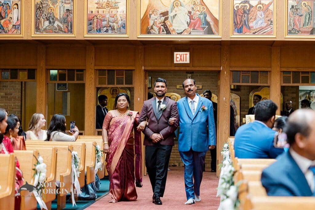 The entrance of the groom at the Embassy Suites by Hilton Naperville Wedding
