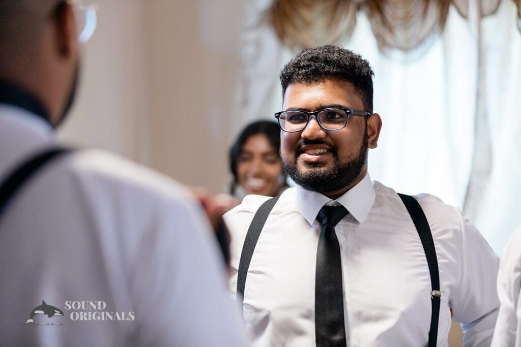 The groom getting ready for his Embassy Suites by Hilton Naperville Wedding