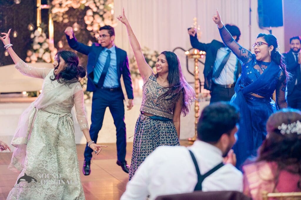Wedding guests on the dance floor at the Embassy Suites by Hilton Naperville Wedding