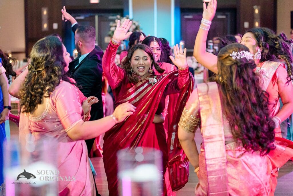 Guests dancing on the dance floor at the Embassy Suites by Hilton Naperville Wedding