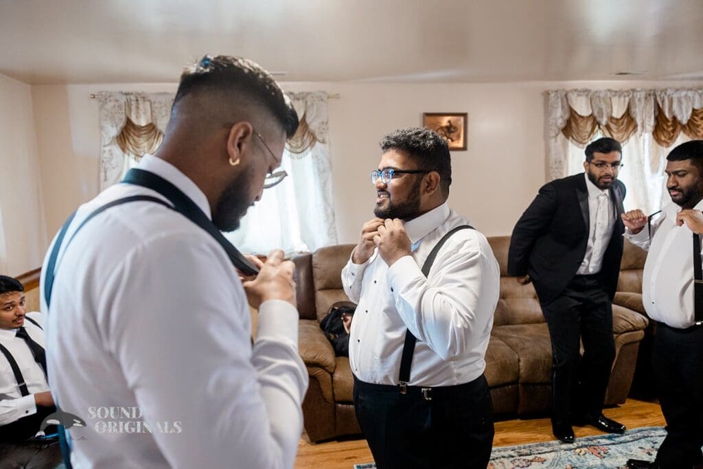 Groom getting ready with his groomsmen near Embassy Suites by Hilton Naperville Wedding