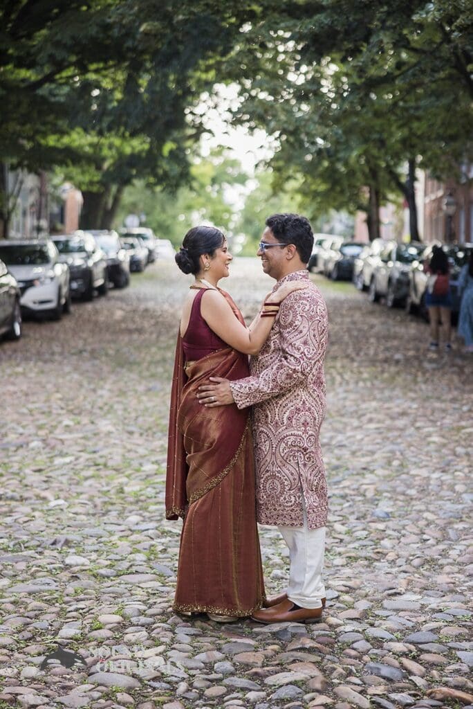 The bride and groom facing each other near the Torpedo Factory Art Center