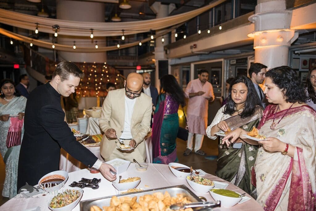 Guests enjoying the food at the Torpedo Factory Art Center Wedding