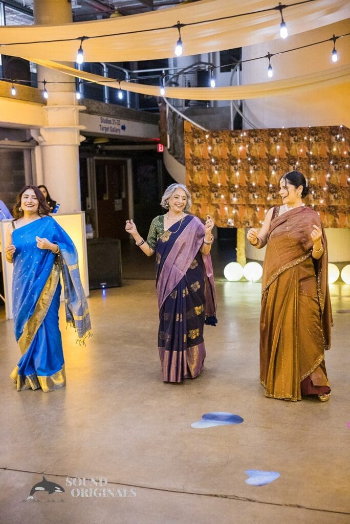 The bride and friends dancing at the Torpedo Factory Art Center Wedding