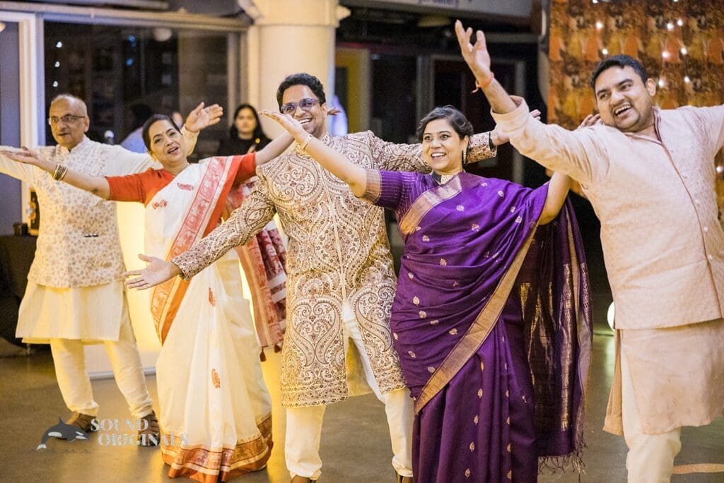 The groom dancing with guests at Torpedo Factory Art Center Wedding