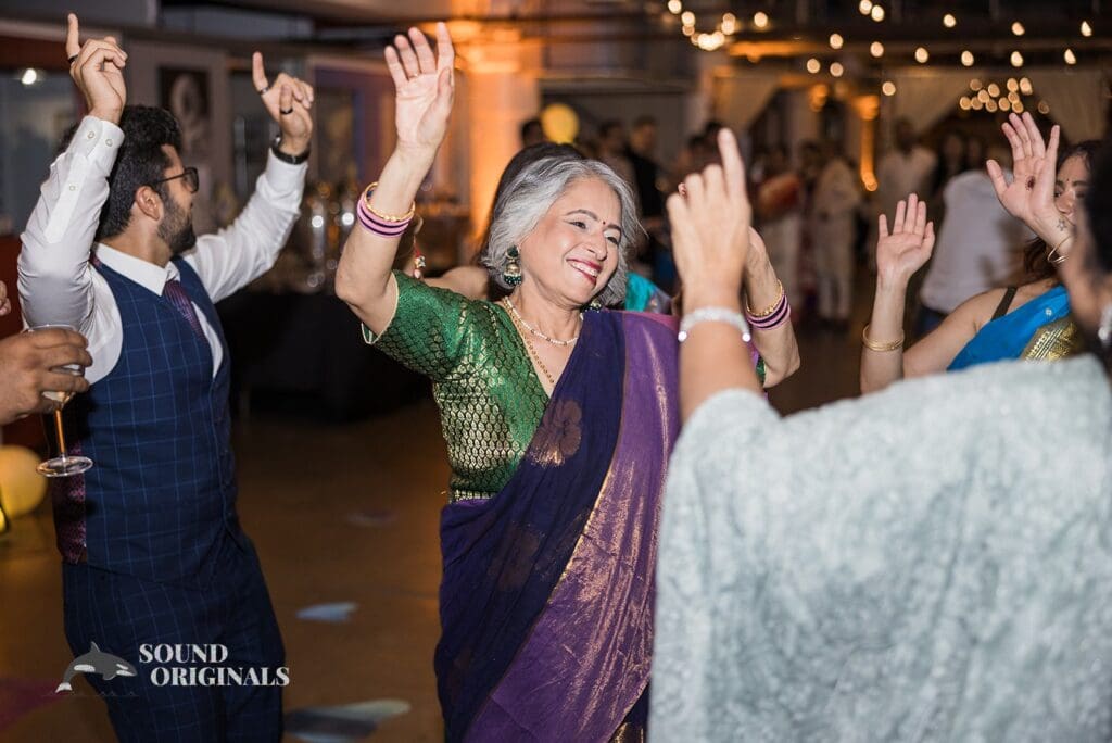 Wedding guests dancing on the dance floor at the Torpedo Factory Art Center Wedding