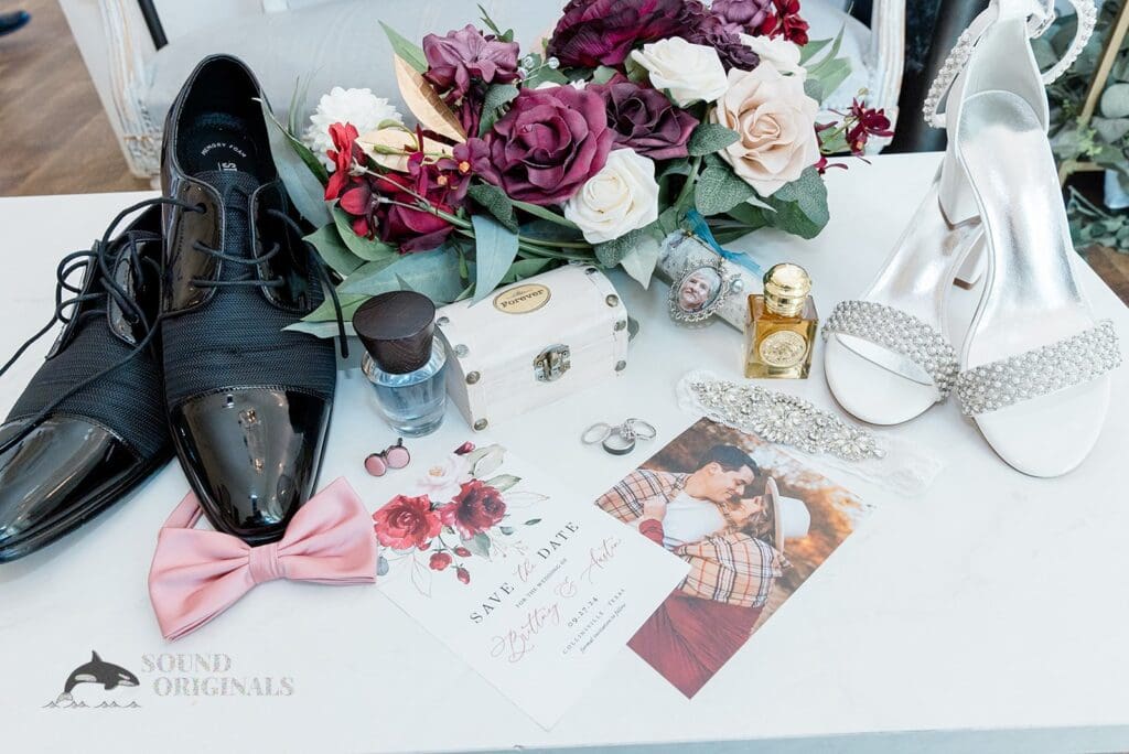 A gorgeous collection of bride and groom shoes, flowers, and diamond rings in The French Farmhouse Wedding