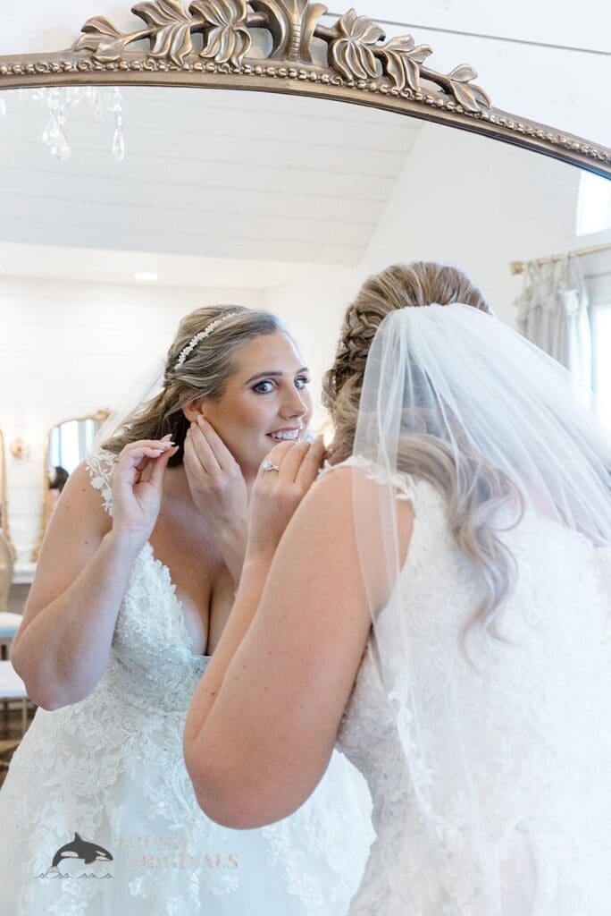 Pretty bride wears her jewellery to get set for The French Farmhouse Wedding