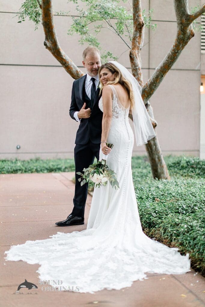Harborside Chapel Wedding Newlyweds hug after the Harborside Chapel Wedding