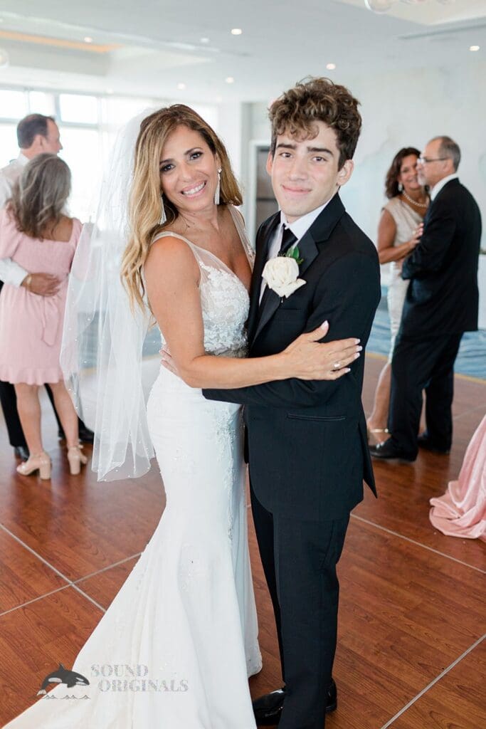 Harborside Chapel Wedding BRide with a significant family meber after the Harborside Chapel Wedding