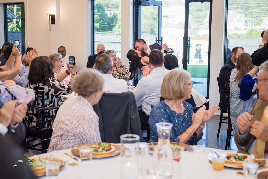 A kiss at The Oakley on the Lake Wedding reception