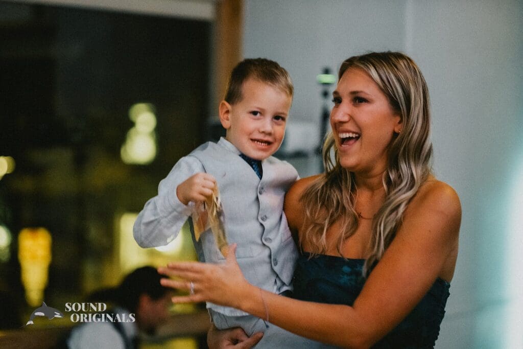 Photographer captures beautiful bride's sister and pretty son in a Rembrandt Yard Wedding
