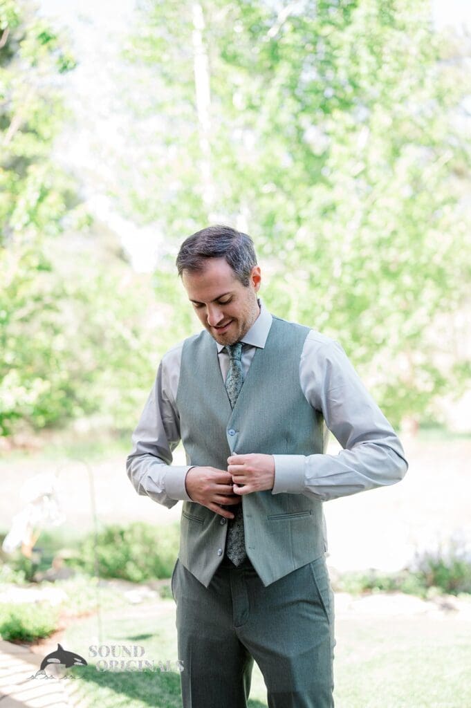 The groom getting ready at The Red Farmhouse Bed & Breakfast Wedding