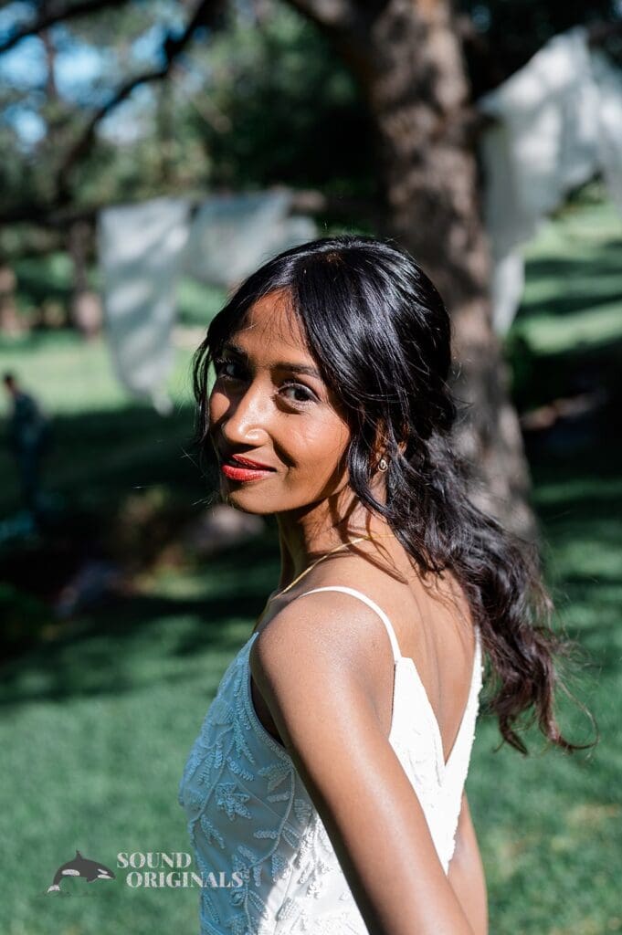 The bride turning to look at the camera at The Red Farmhouse Bed & Breakfast Wedding