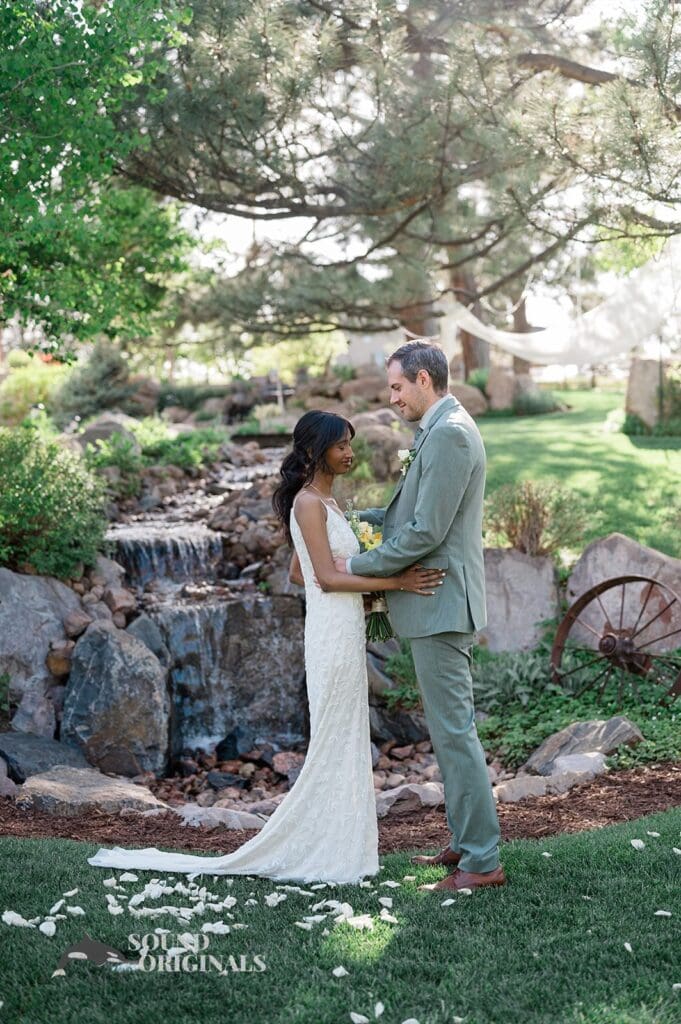 Wedding photographer takes stunning photo of bride and groom at The Red Farmhouse Bed & Breakfast Wedding