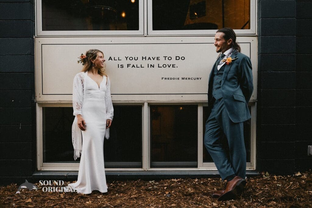 Romantic photo of bride and groom in front of Rembrandt Yard