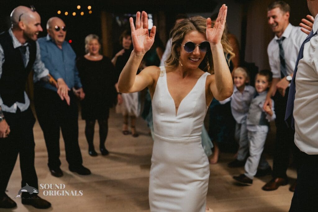 Happy bride shows off calm dance moves in Rembrandt Yard Wedding