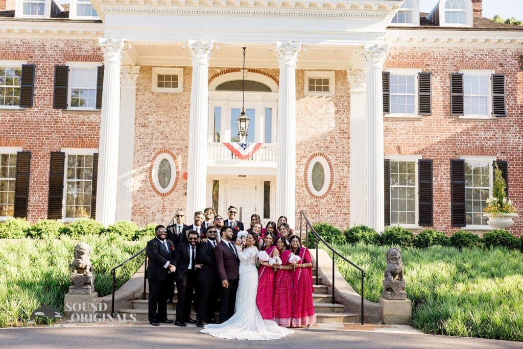 The bride and groom with their bridal party at the Embassy Suites by Hilton Naperville Wedding