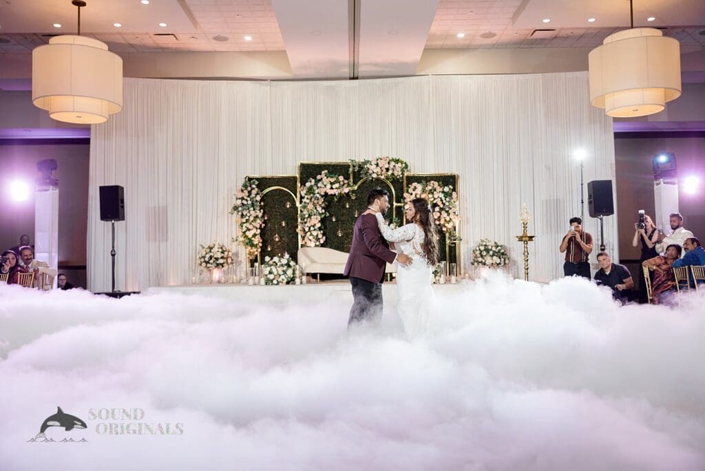 The bride and groom enjoying their first dance at the Embassy Suites by Hilton Naperville Wedding