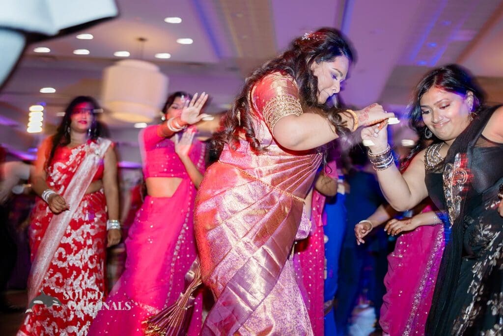 The bride on the dance floor at the Embassy Suites by Hilton Naperville Wedding