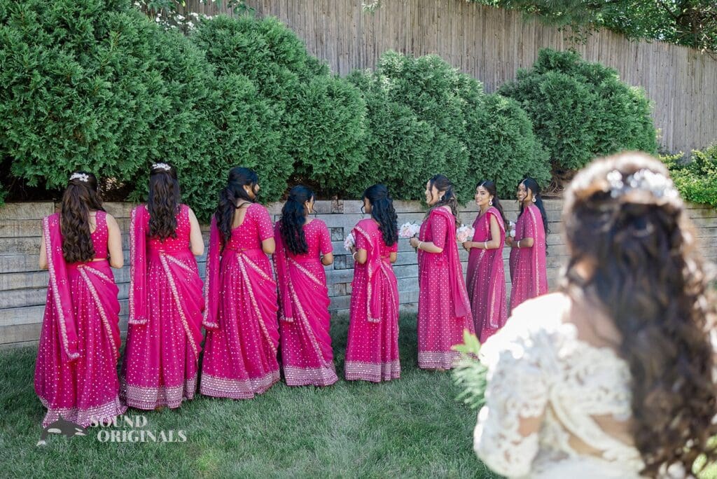 The bridesmaids getting ready to see the bride at the Embassy Suites by Hilton Naperville Wedding