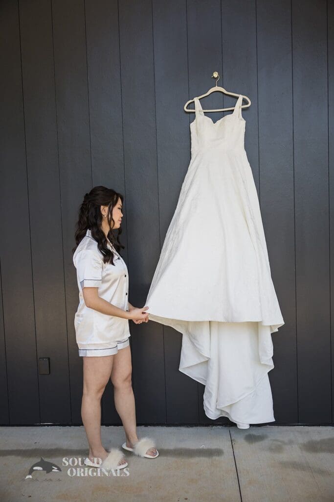 Wedding dress hanging near the The Oakley on the Lake Wedding