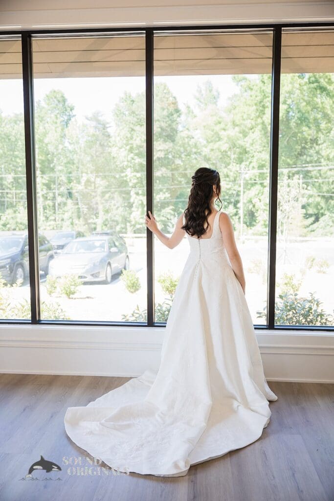 Romantic portrait of the bride in her wedding dress at The Oakley on the Lake Wedding