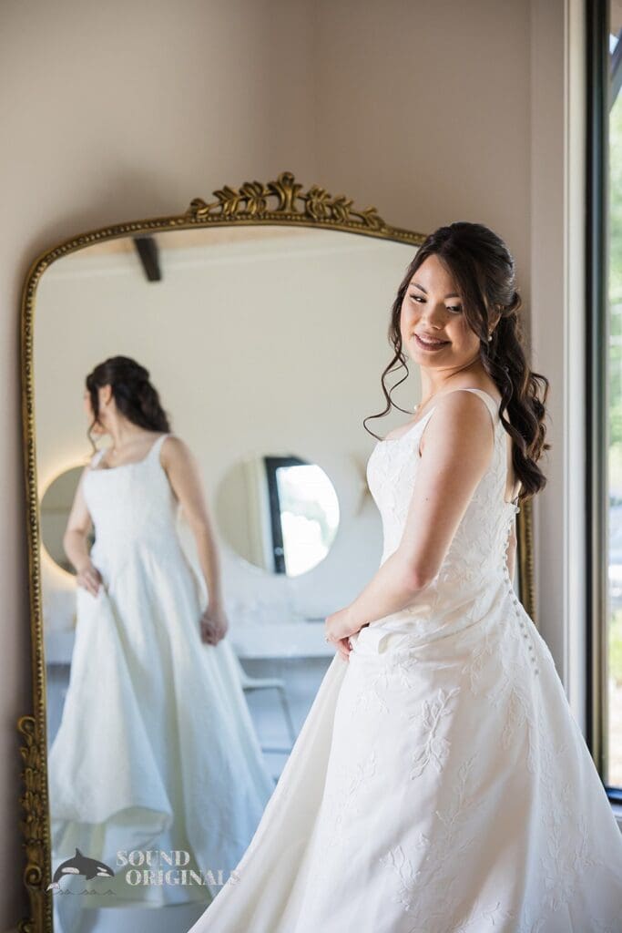 Wedding photographer captures gorgeous portrait of the bride in her wedding dress at The Oakley on the Lake Wedding